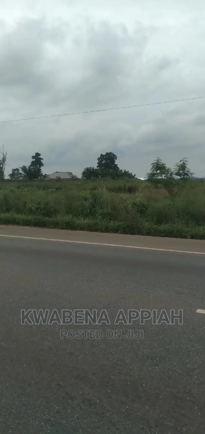 About Two and Half Echer Land at Accra Kumasi High Way
