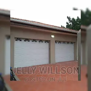 Two Garage Door With Arc Fanlight