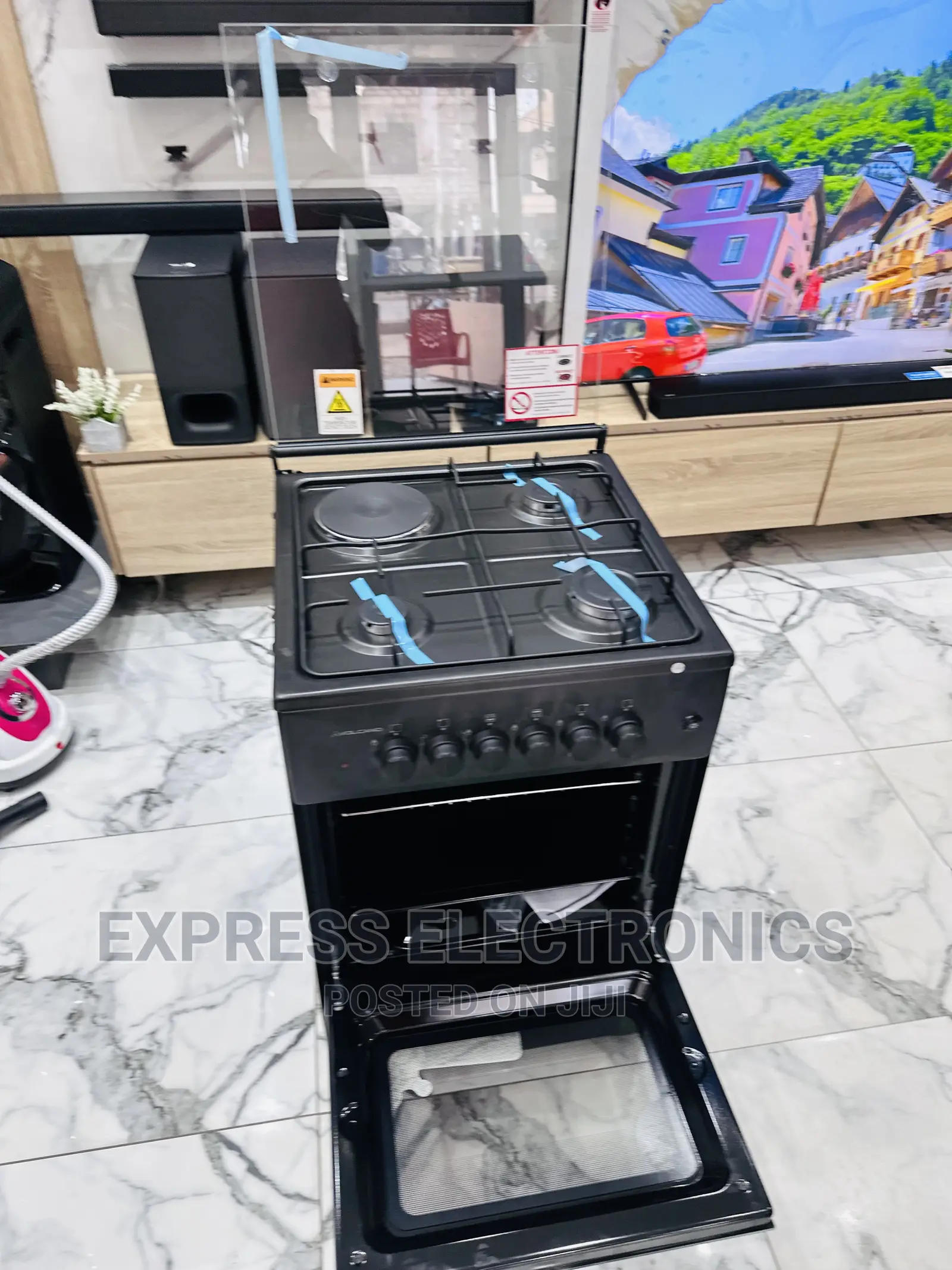 Outstanding Sleek Black 3-1 Stove Oven Grill 50/50