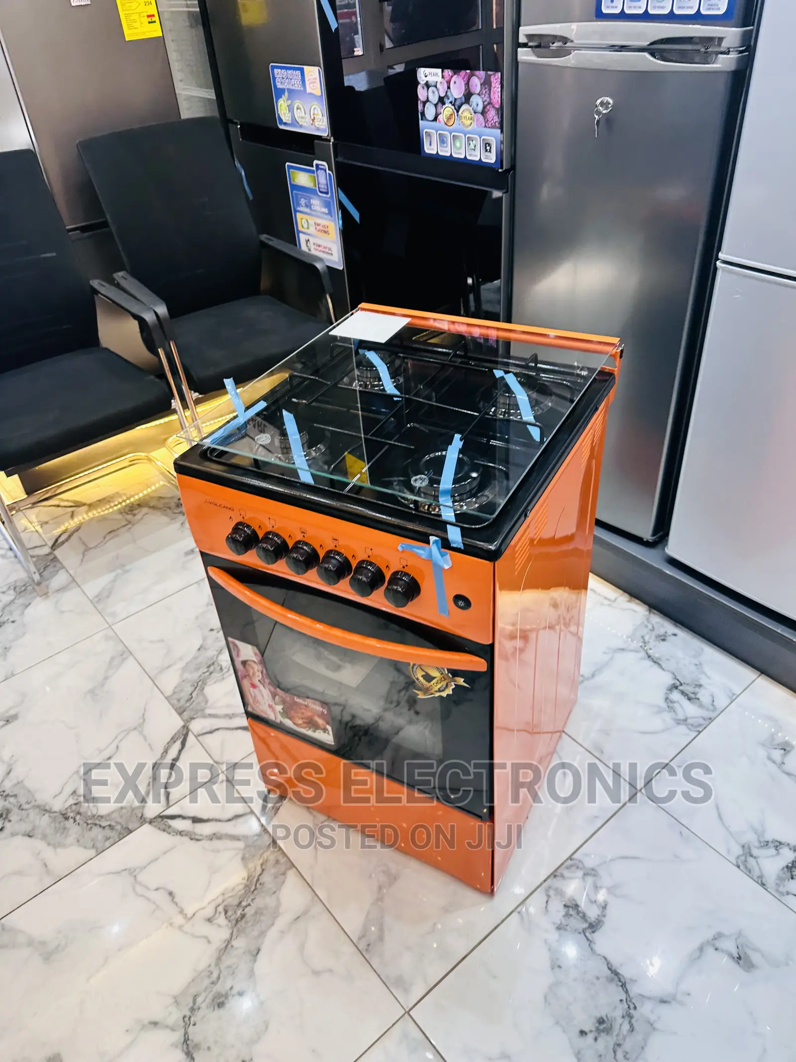 Flame  It Up With Orange Gas Cooker 50/50 Oven 4burner