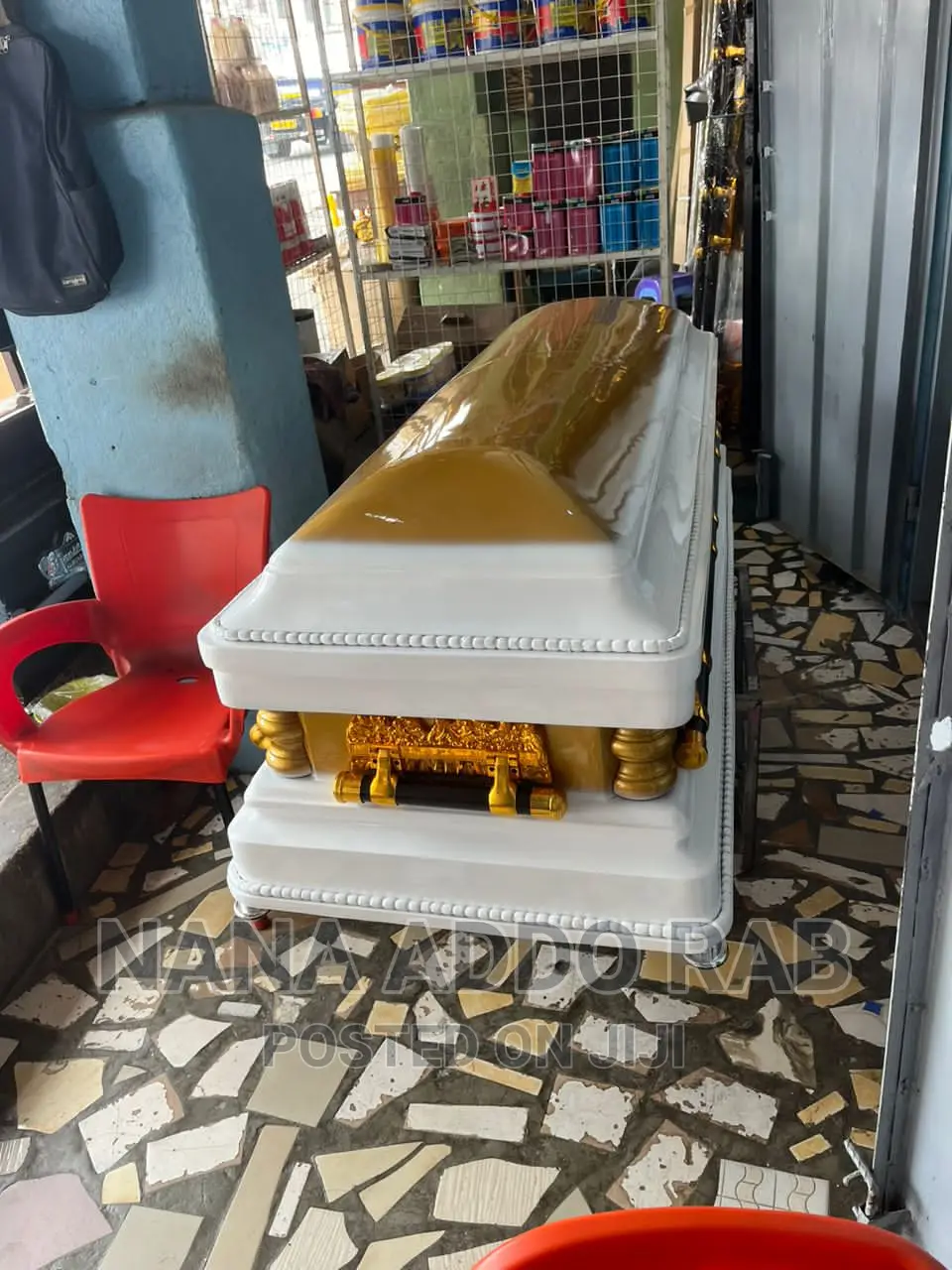 Proudly Made in Ghana Casket Gold Handles and White Interior