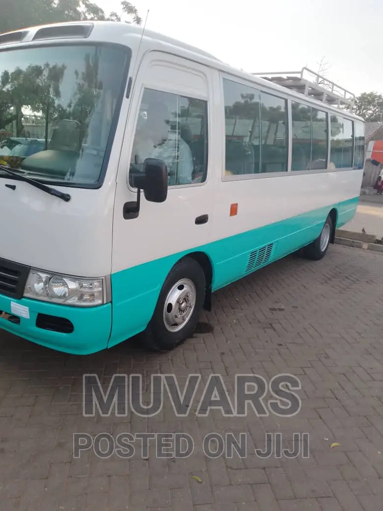 Car Rentals Service. Coaster Bus for Hiring