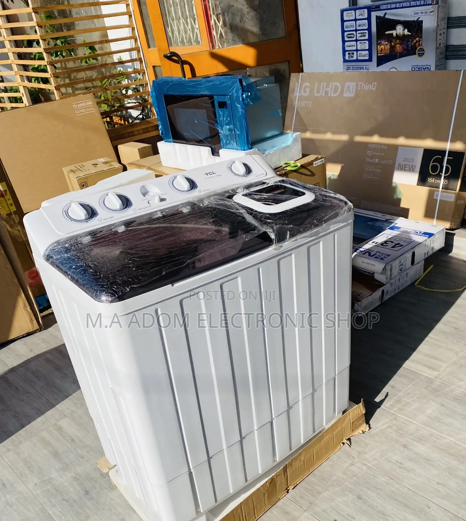 Fabulous TCL 10kg Top Load Washing Machine + Spin Dry.
