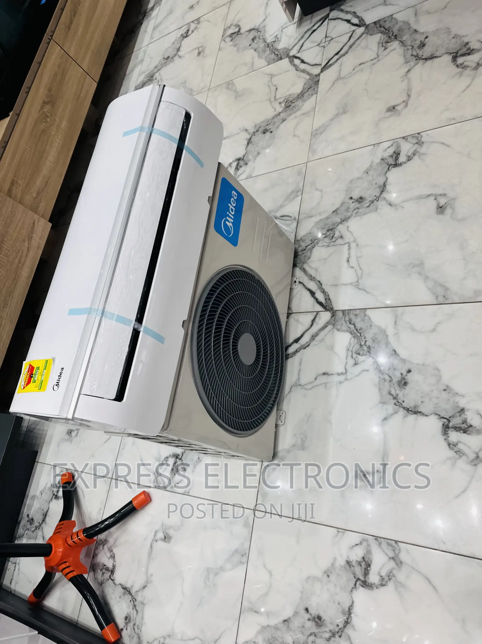 Very Affordable Sleek White AC Midea 2.0hp AC