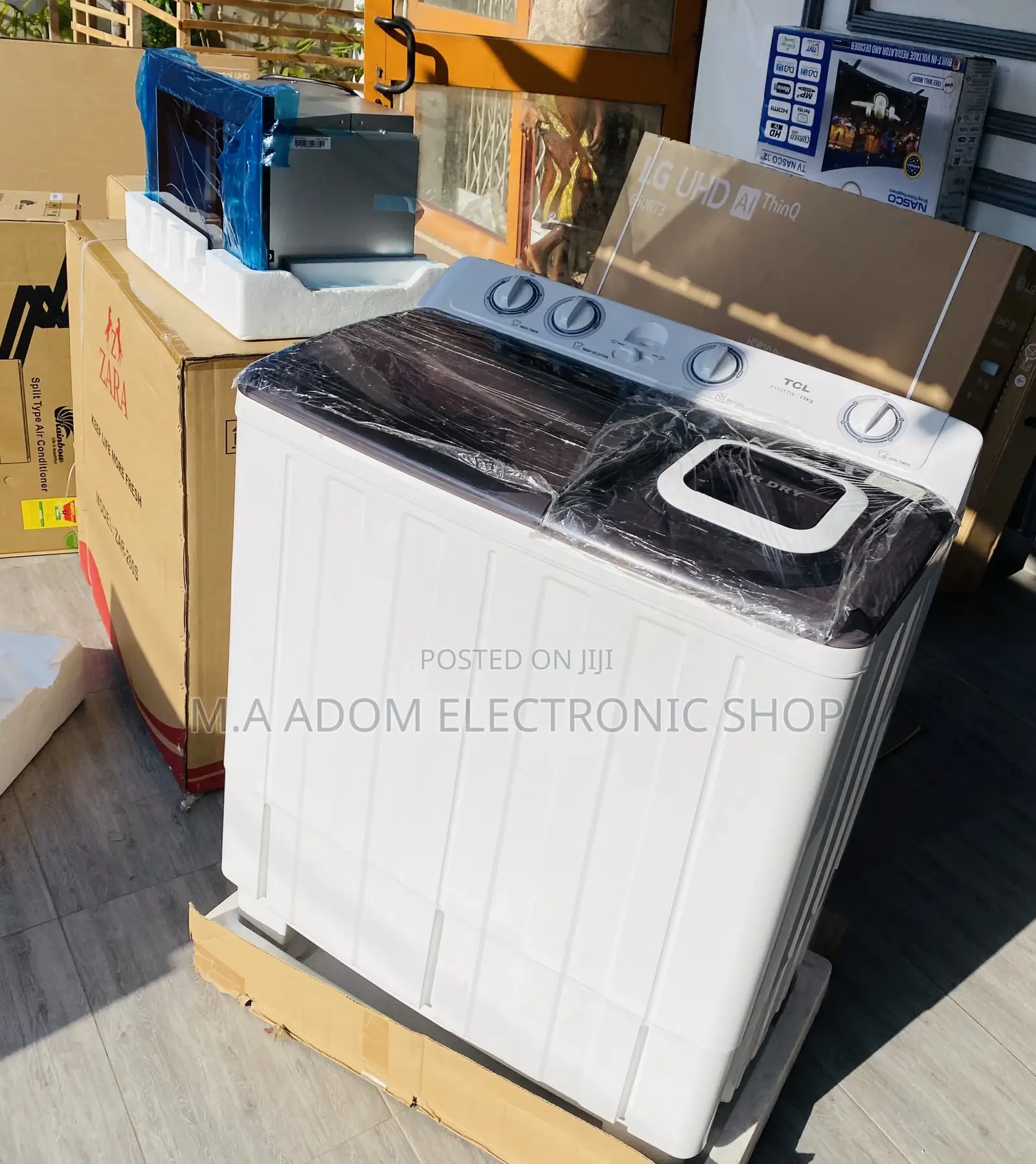 Free Standing TCL 10kg Semi-Automatic Washing Machine.