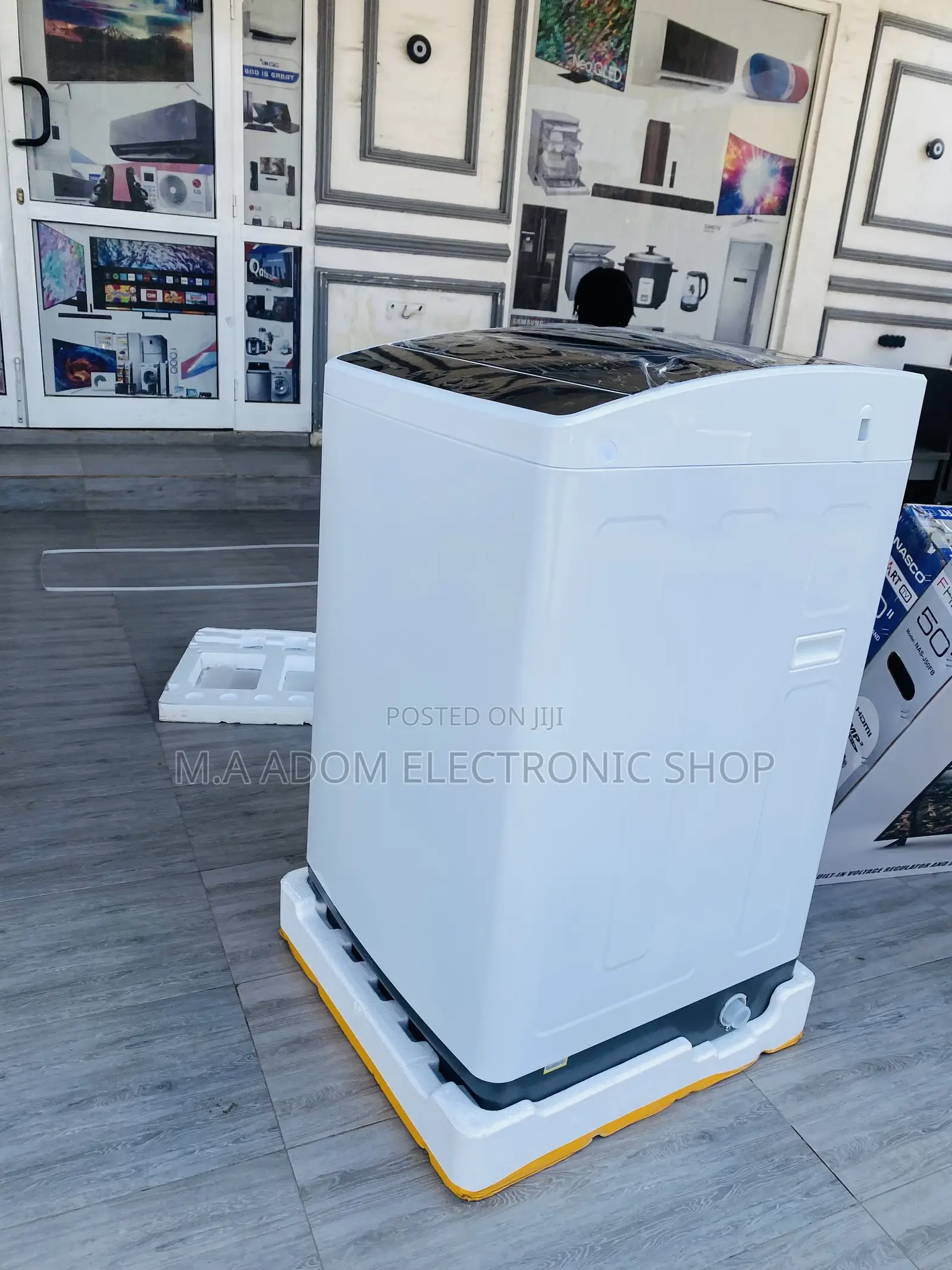 Energy Sufficient TCL 8kg Top Load Electric Washing Machine.