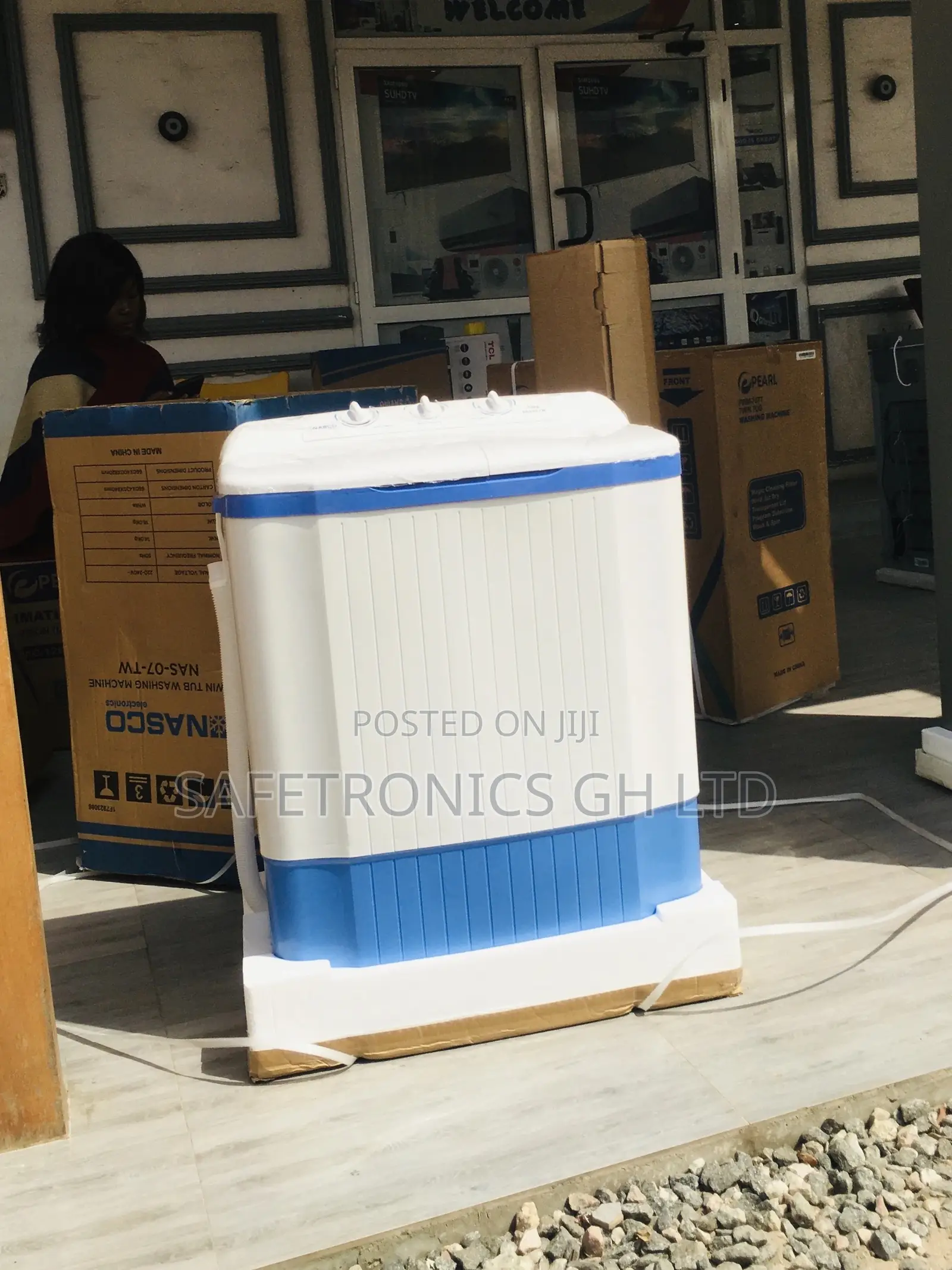 White Washingmachine Blue Topload 7kg Semiautomatic Nasco