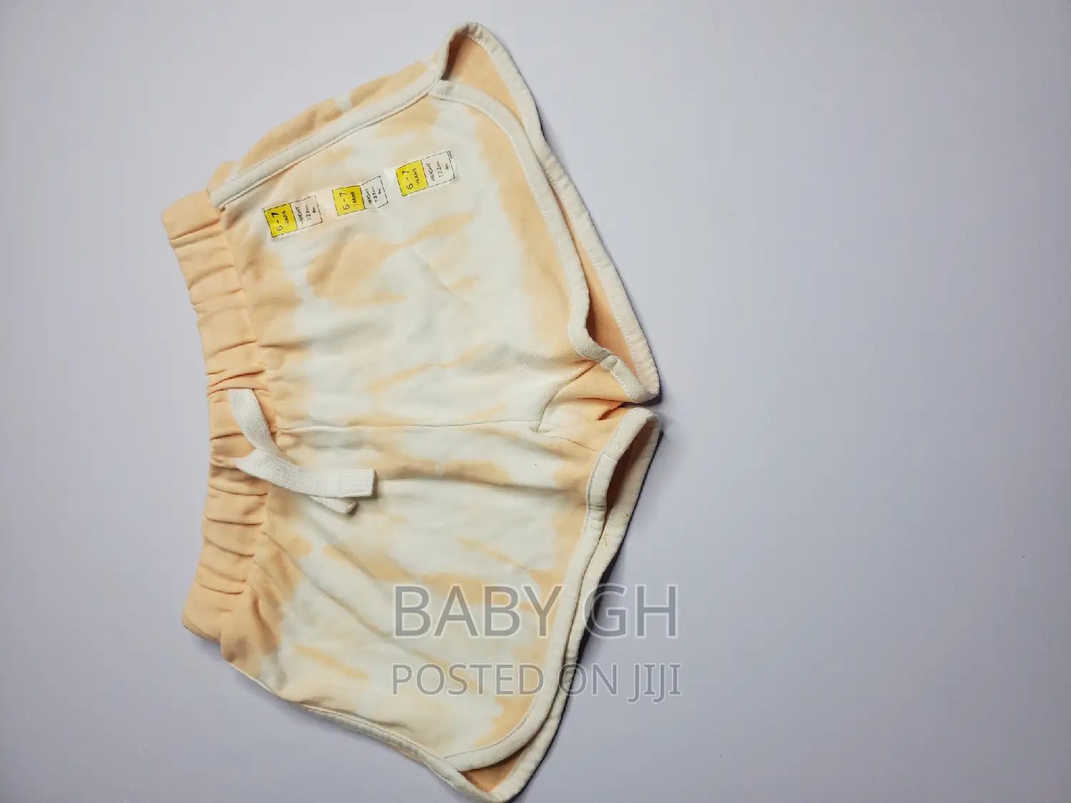 All in Motion Orange and White Water Color Soft Shorts