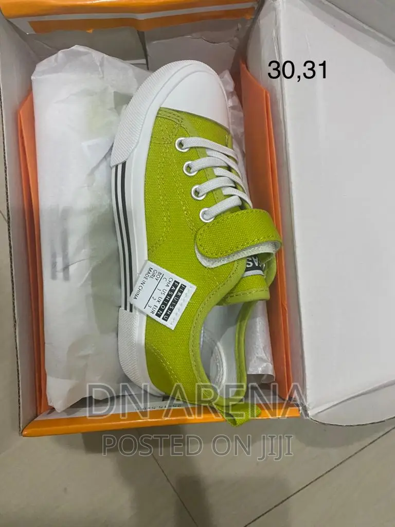 Kids All Stars Sneakers Neatly in a Box 