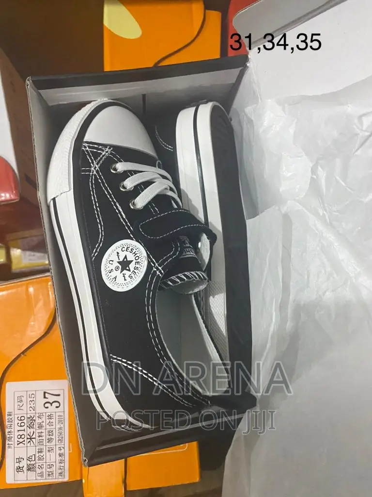 Kids All Stars Sneakers Neatly in a Box 