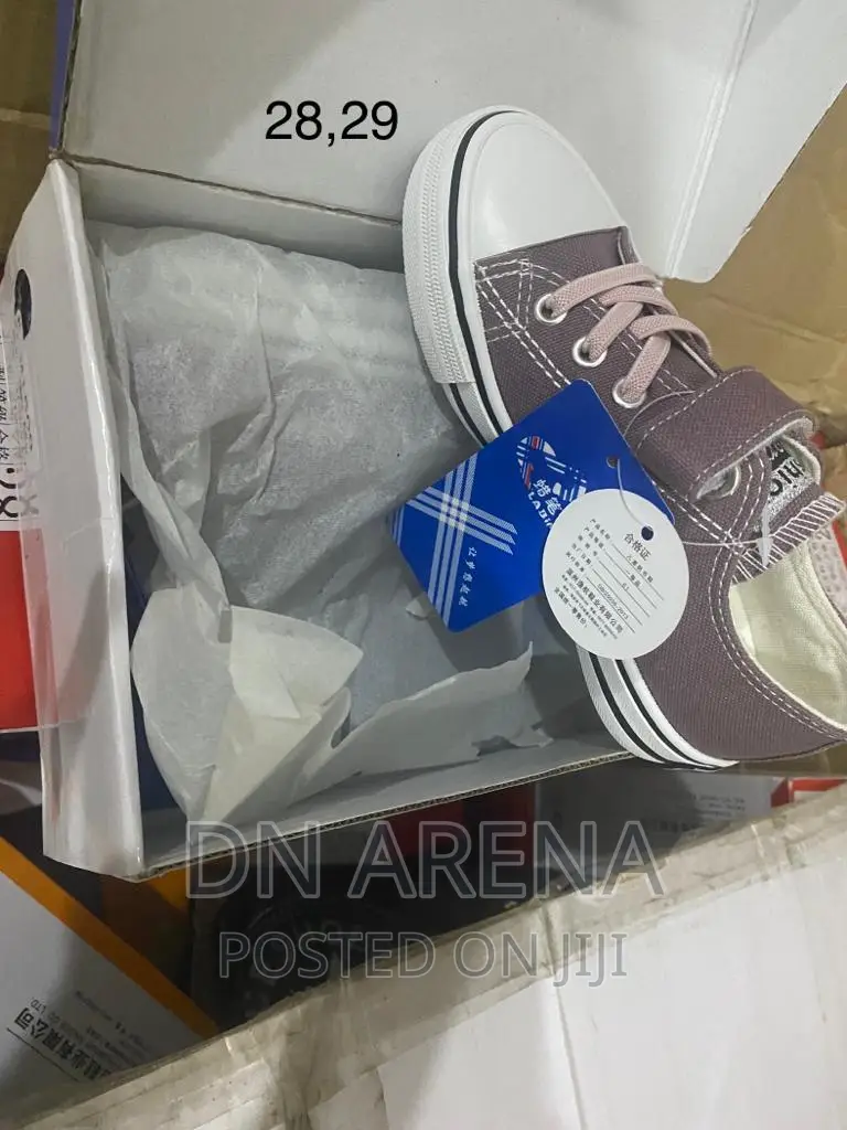 Kids All Stars Sneakers Neatly in a Box 