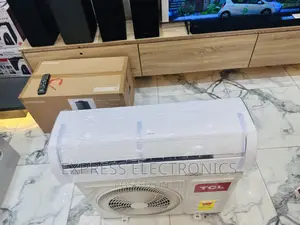 1.5bp Split R410 Gas TCL AC White —-