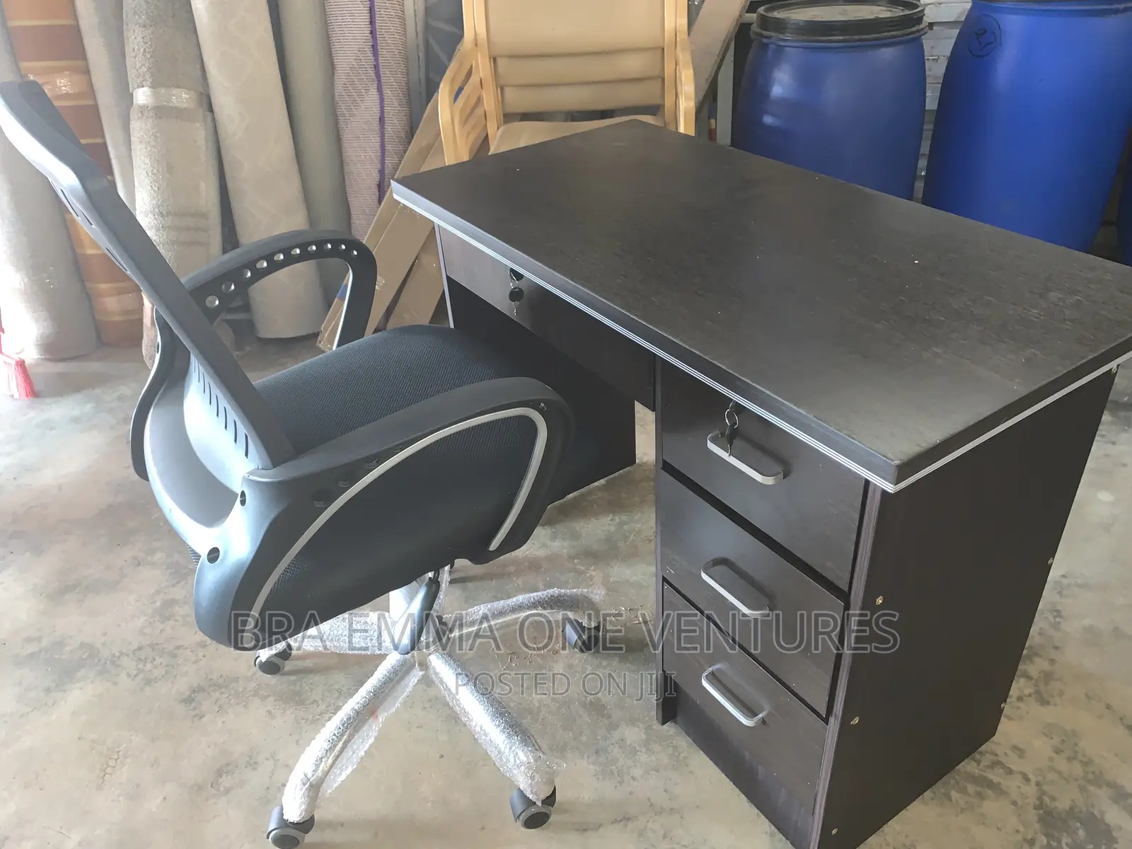 Brand New Table With Four Drawers and a Chair