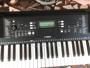 Yamaha PSRE373 61-Key Touch Sensitive Portable Keyboard