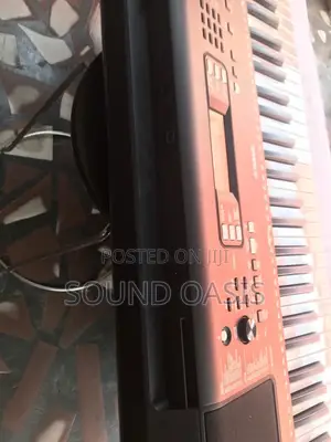 Yamaha PSRE373 61-Key Touch Sensitive Portable Keyboard