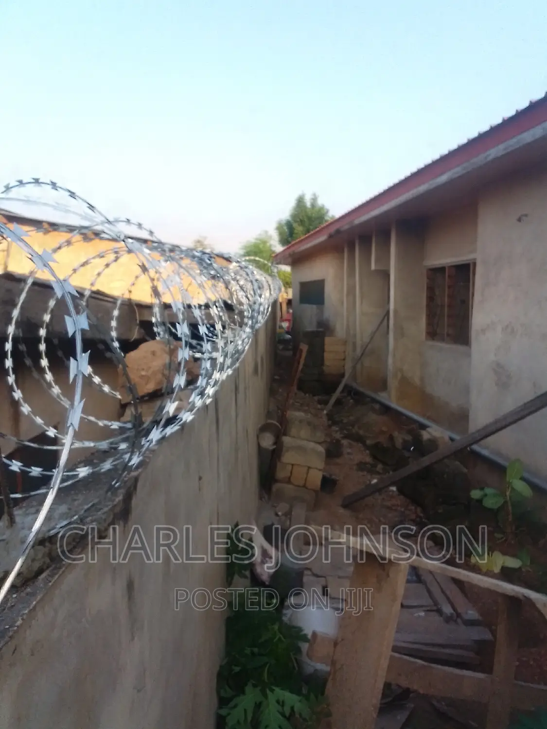 Razor Wire Installation and Security Camera.
