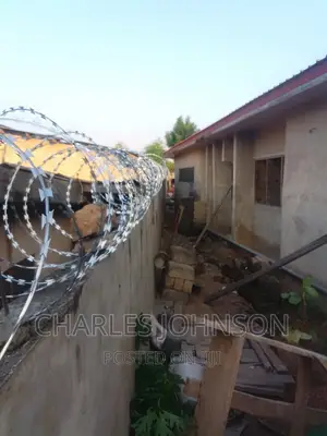 Razor Wire Installation and Security Camera.
