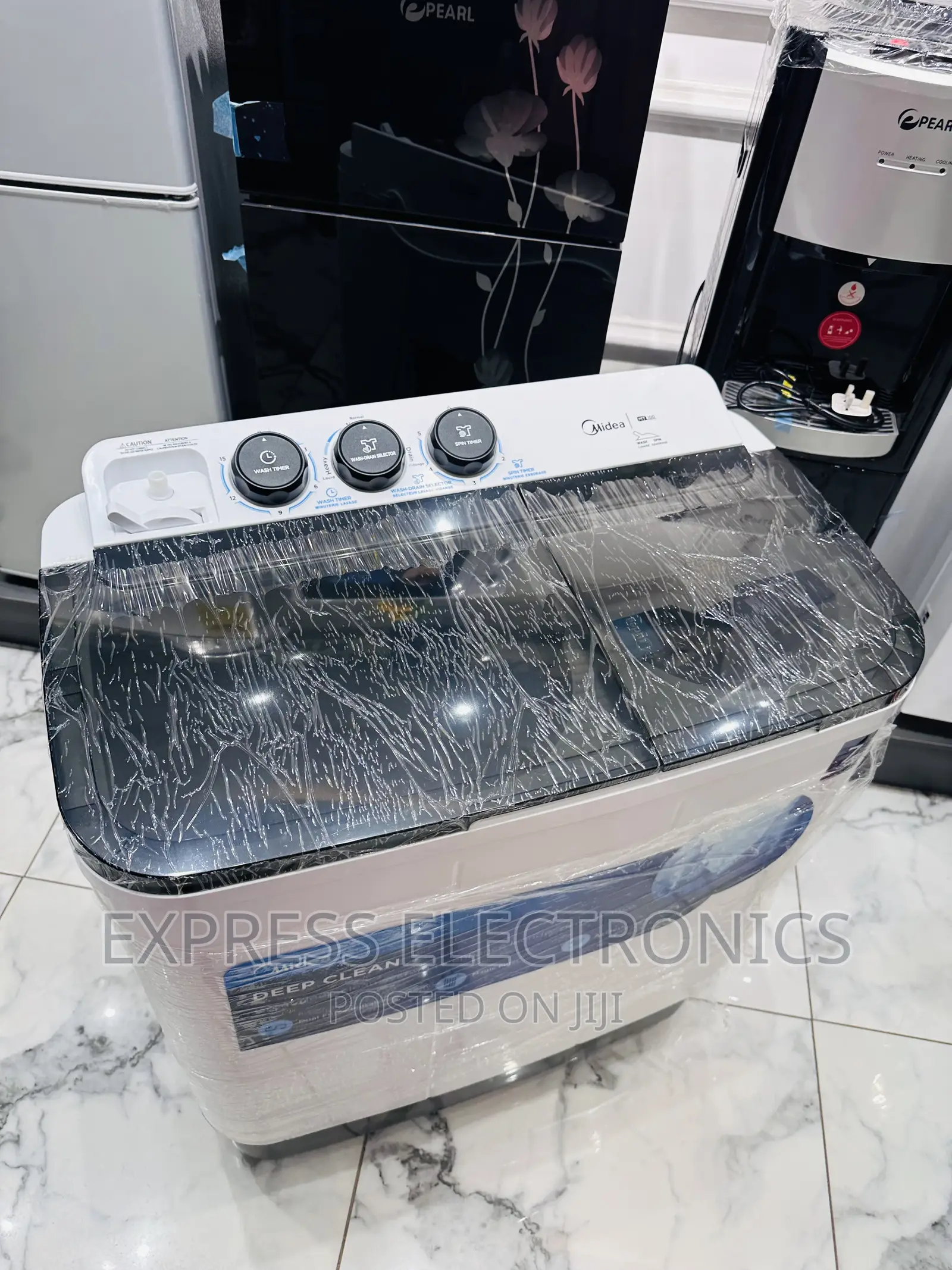 Grab a Deal on 7kg Topload Washing Machine Midea