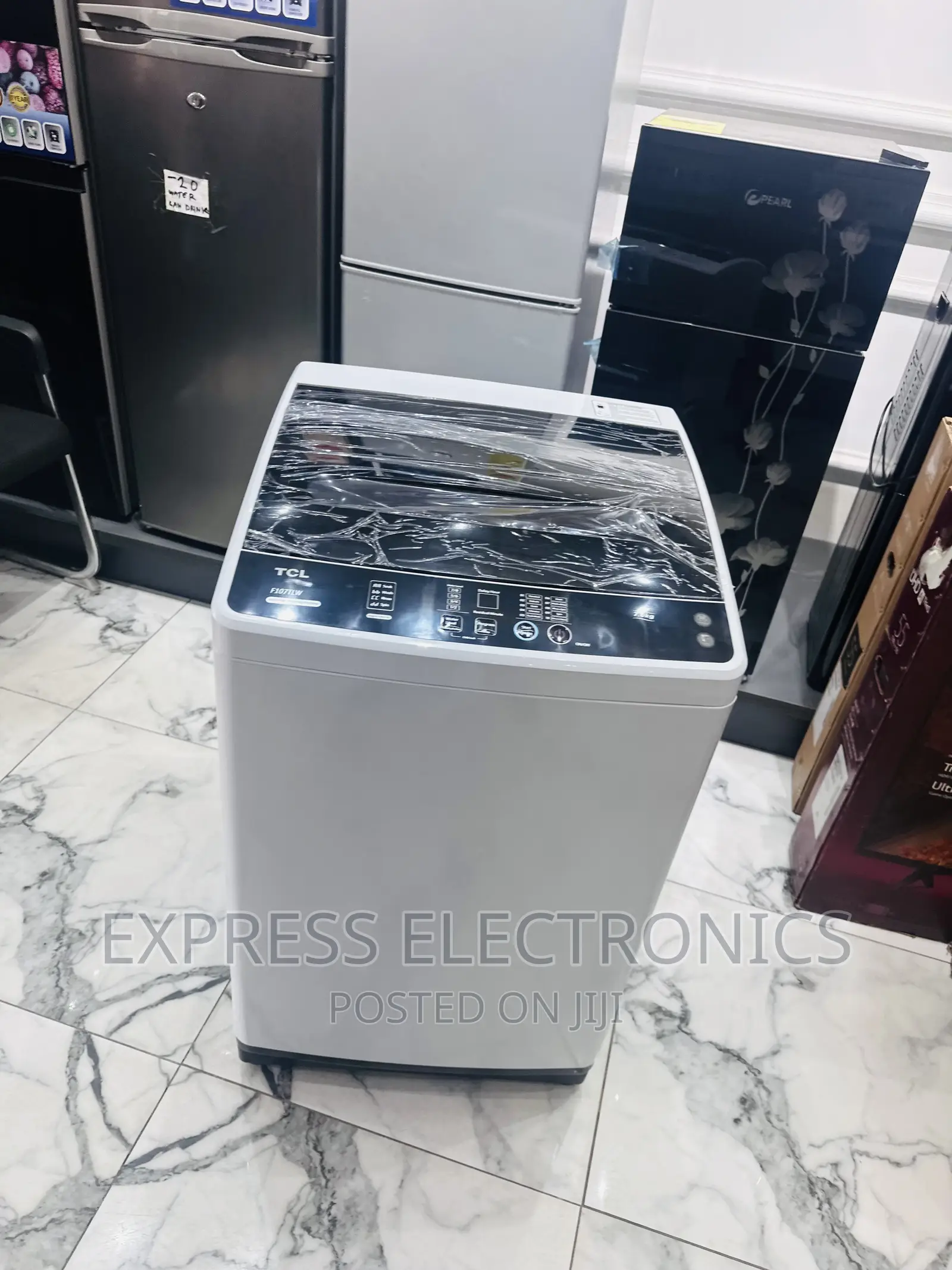 Auto Fill WM TCL 7kg Top Load Full Automatic—