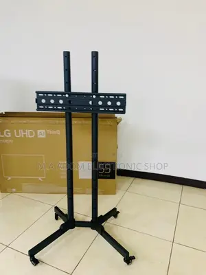 Photo - Shop Original Moveable Tv Trolly for 32” to 70”.