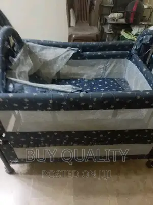 Baby's Cot With Mosquito Net