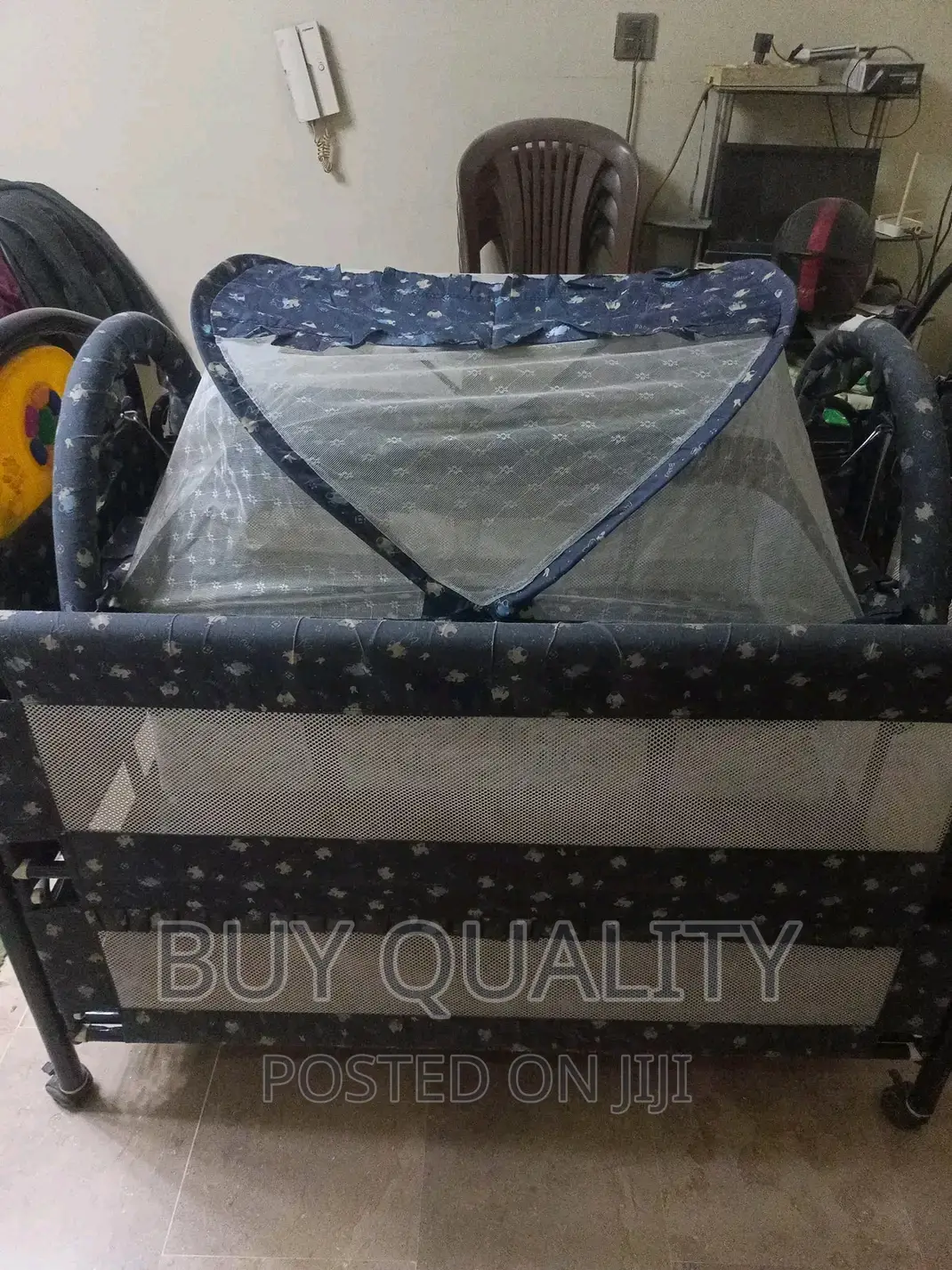 Baby's Cot With Mosquito Net