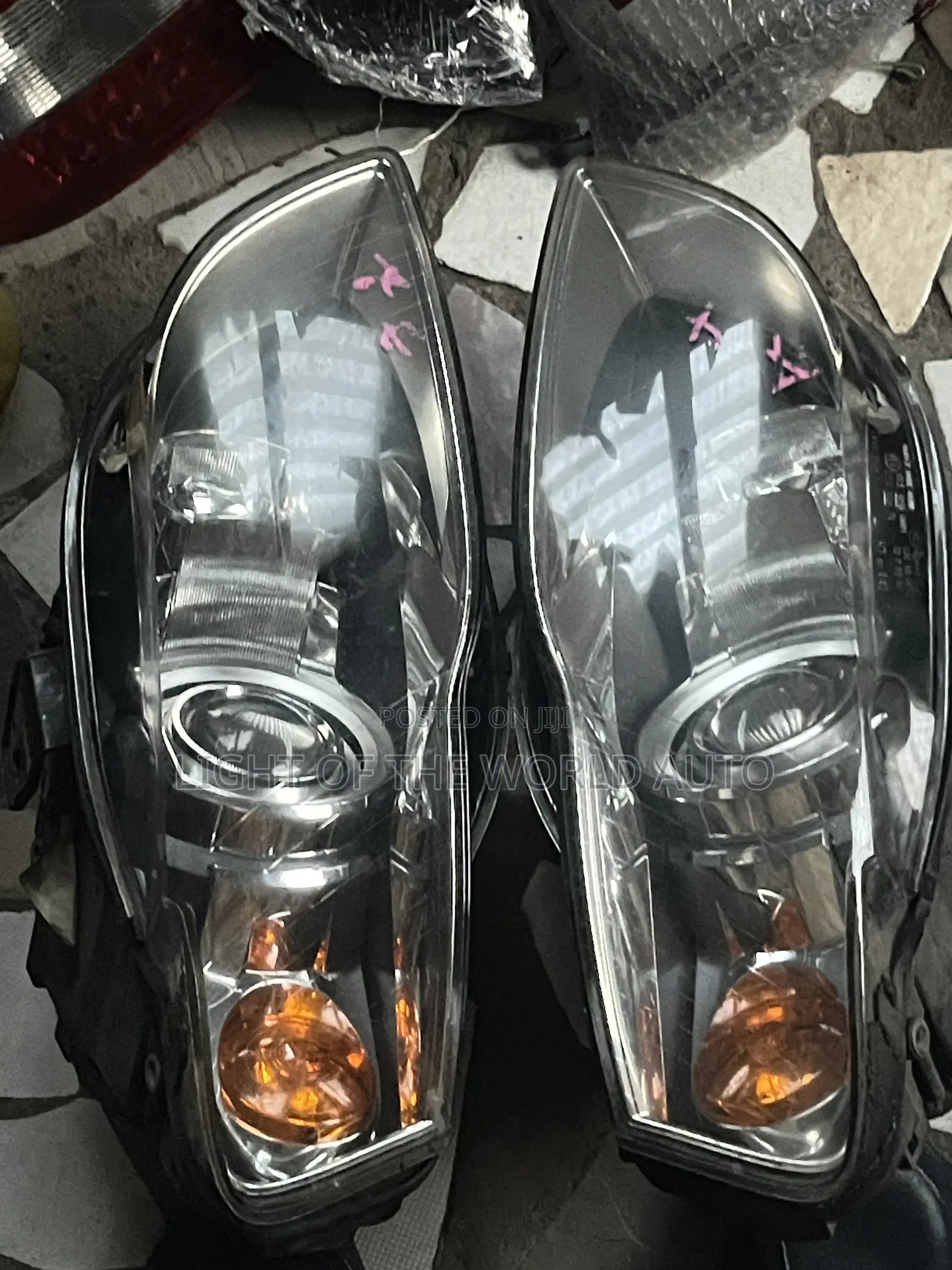 Audi A4 2005 Headlight With Charger Booster on It
