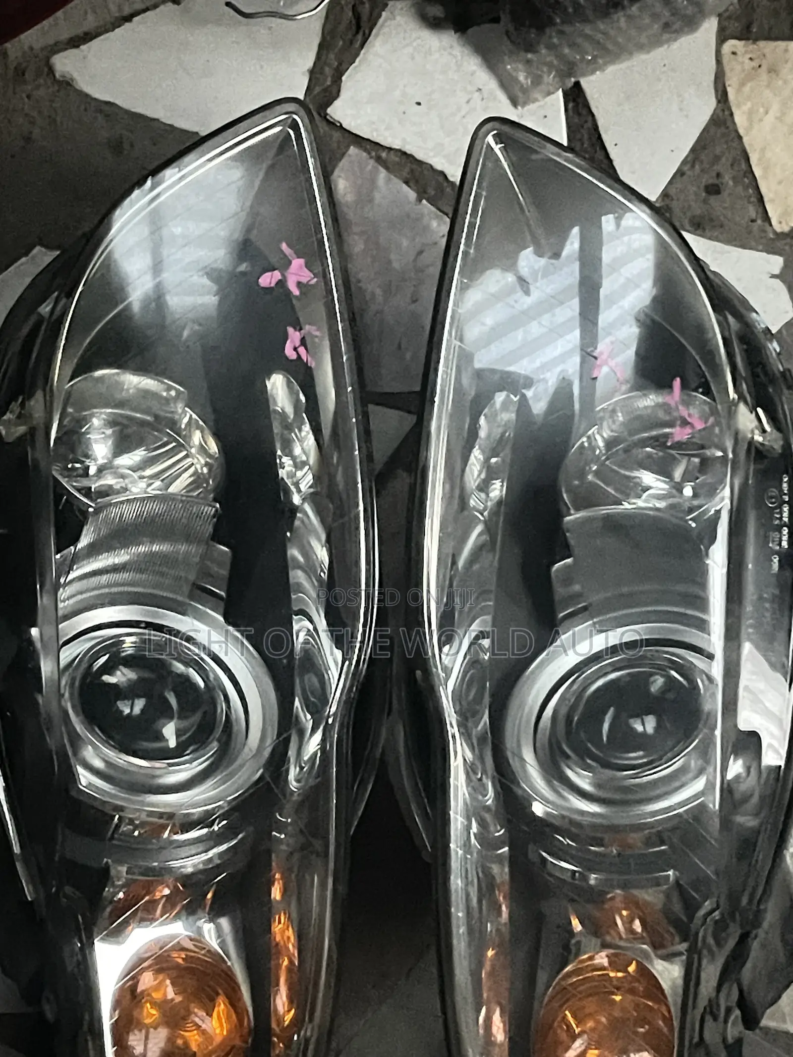 Audi A4 2005 Headlight With Charger Booster on It