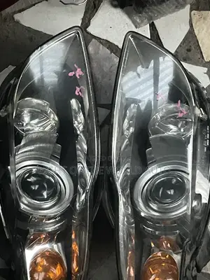 Audi A4 2005 Headlight With Charger Booster on It