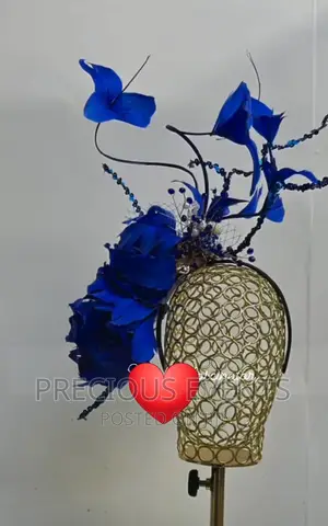 Photo - Fascinators With Ironwork on a Blue Feather.