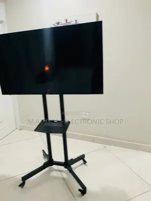 Purchase Adorable Moveable Tv Trolly for 32” - 70 Inch Tv.
