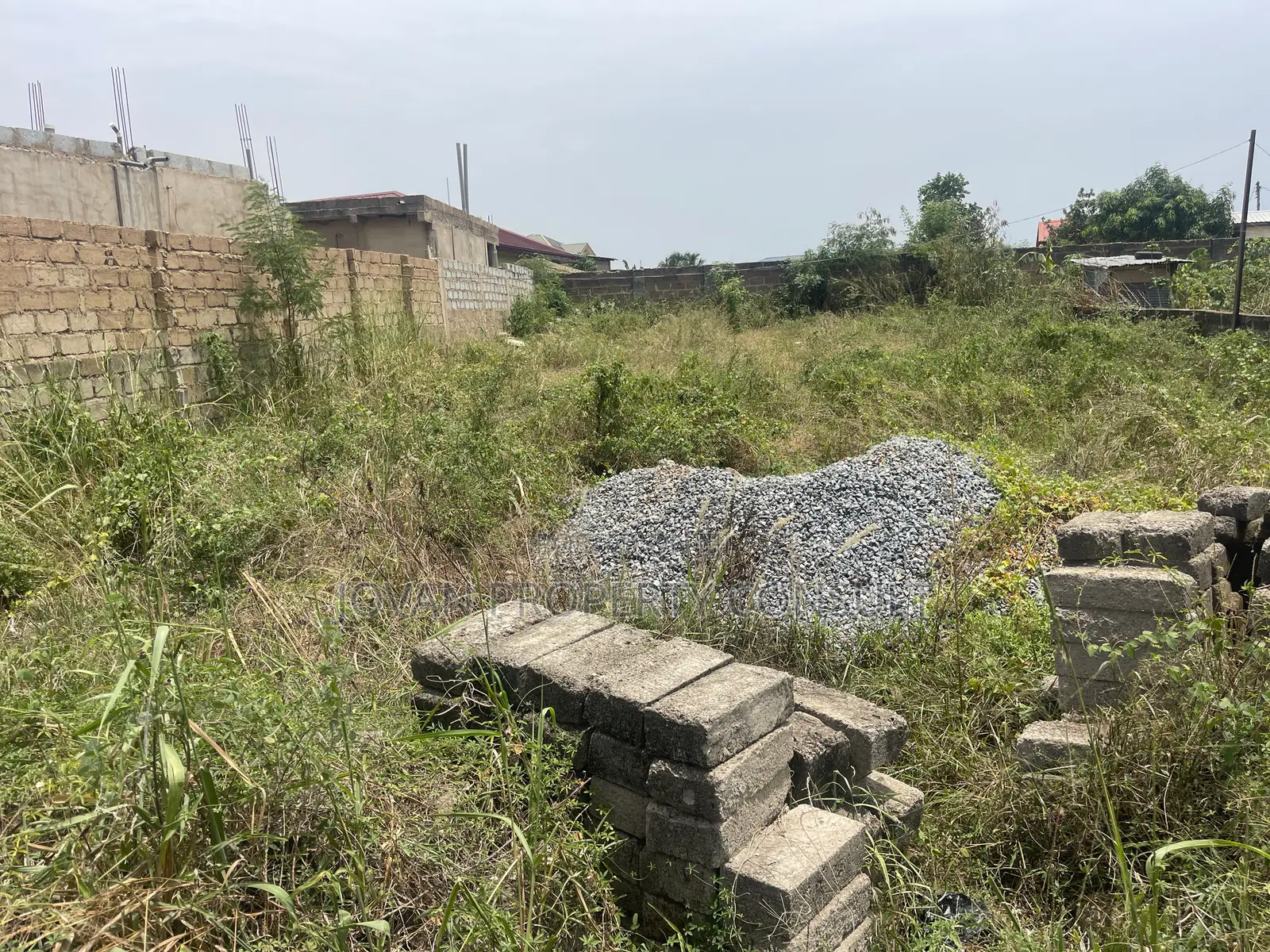 Half Plot for Sale at Amasaman Cocoboard 170,000 Cedis