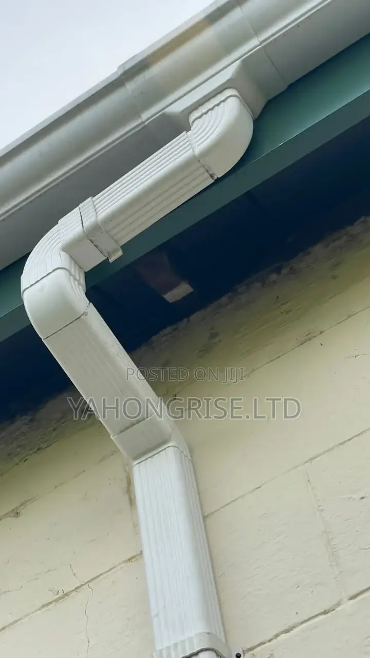 White PVC Downspout and Gutters