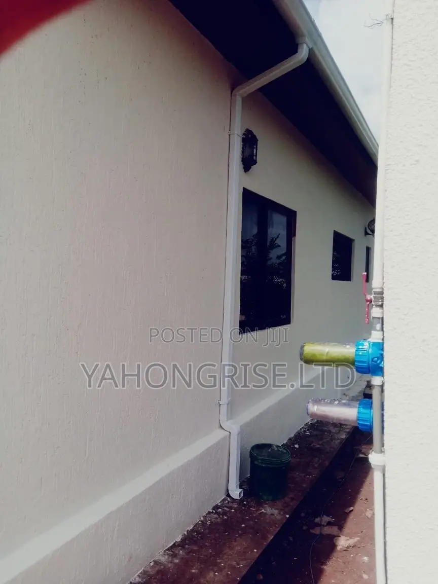 White PVC Gutter and Downspout