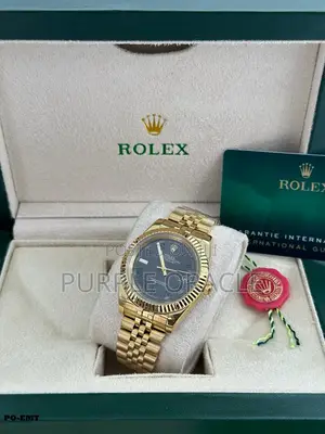 Rolex Oyster Perpetual Rainbow Gold Watch