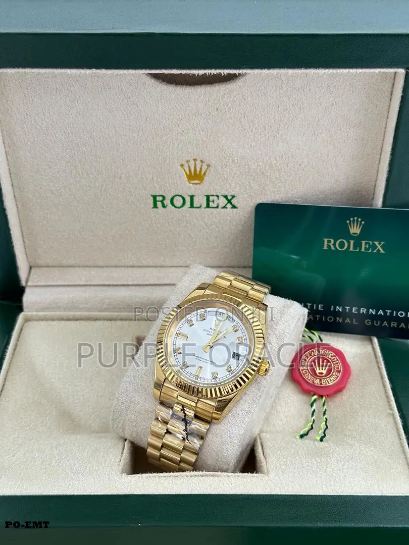 Rolex Oyster Perpetual Rainbow Gold Watch