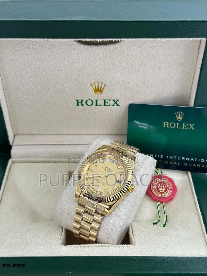 Rolex Oyster Perpetual Rainbow Gold Watch