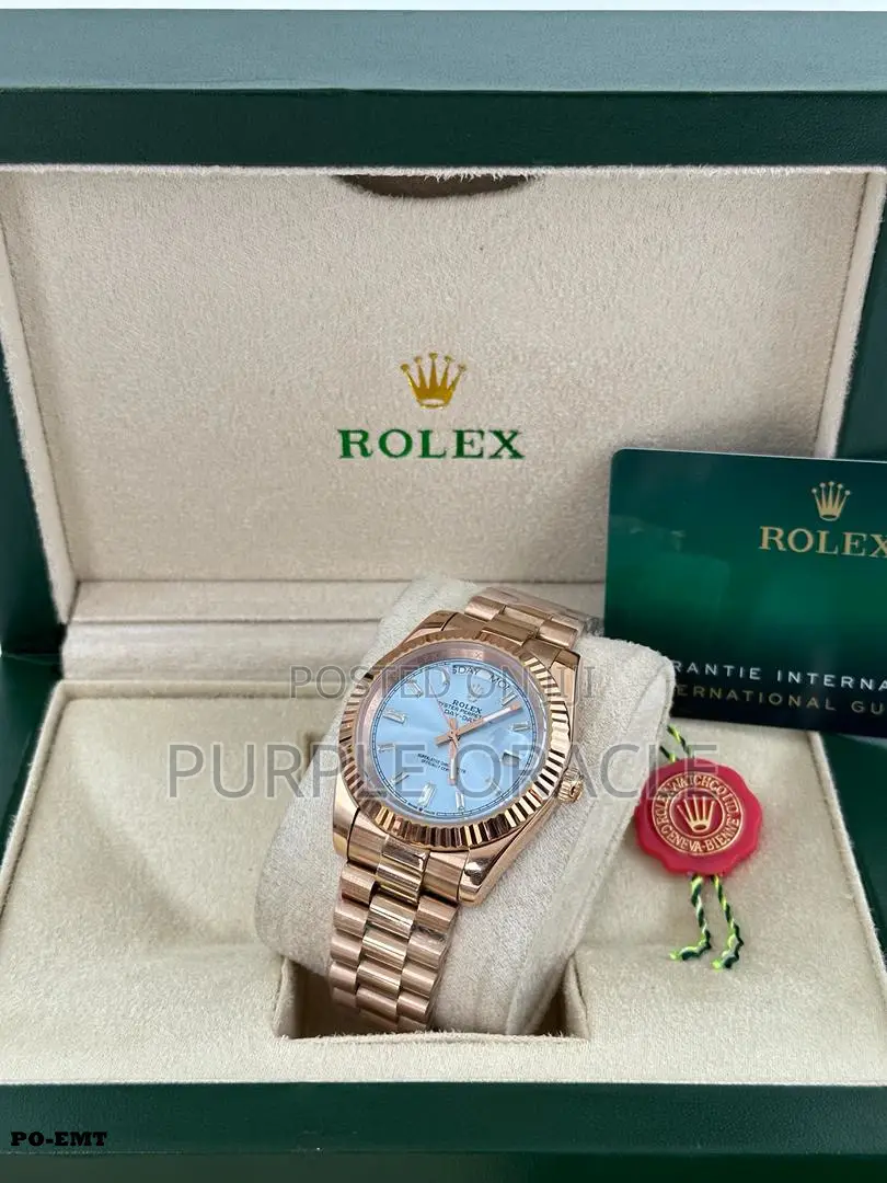Rolex Oyster Perpetual Rainbow Gold Watch