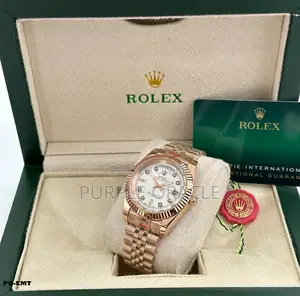 Rolex Oyster Perpetual Rainbow Gold Watch