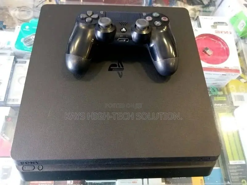 Playstation 4 Slim With 2 Controllers and New Games
