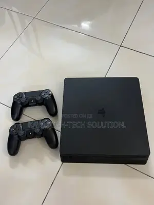 Playstation 4 Slim With 2 Controllers and New Games