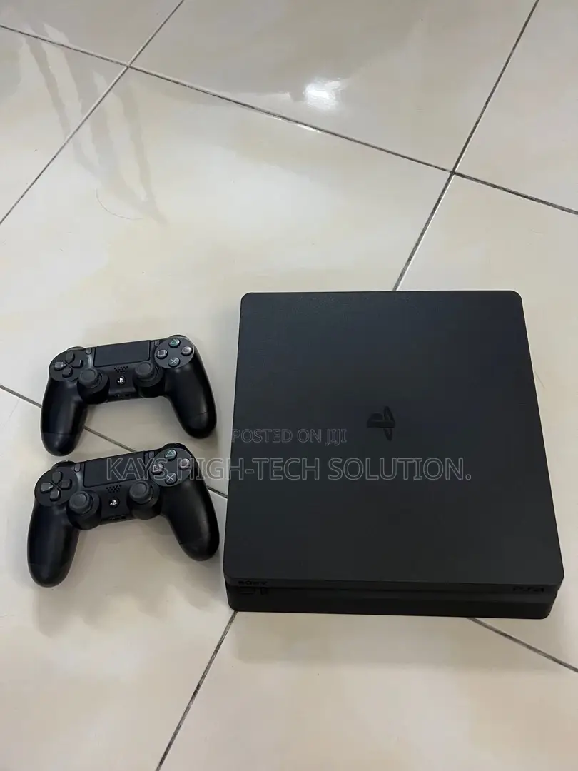 Playstation 4 Slim With 2 Controllers and New Games