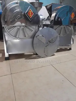 Cassava Slicer And Vegetable Shredder.