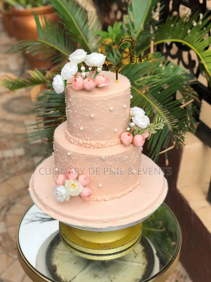 Peach With Pearls Wedding Cake