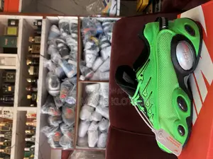 Nike Nocta Glide X Drake "Slime Green"