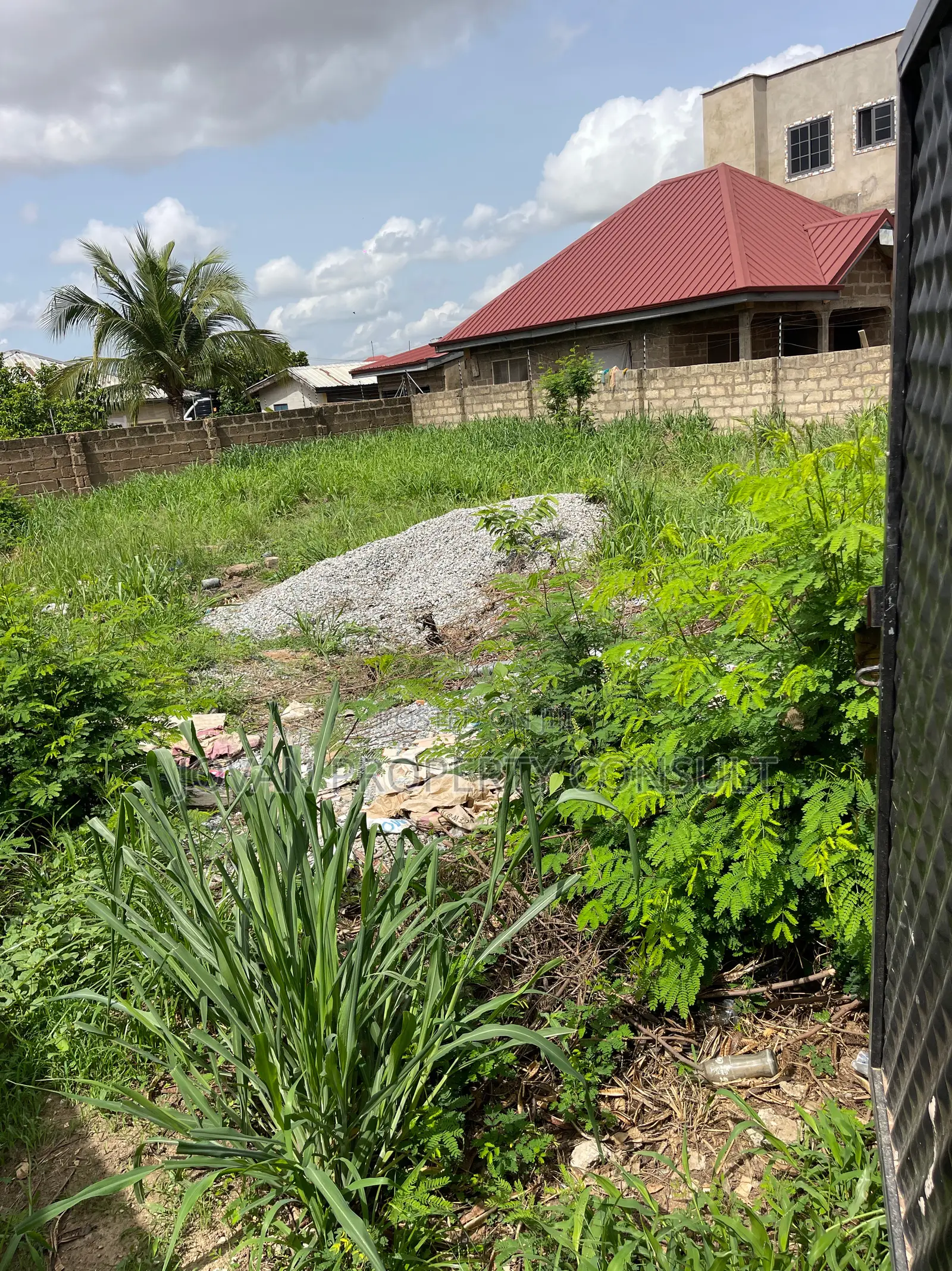 Wall and Gated Land for Sale at Amasaman 480,000 Cedis