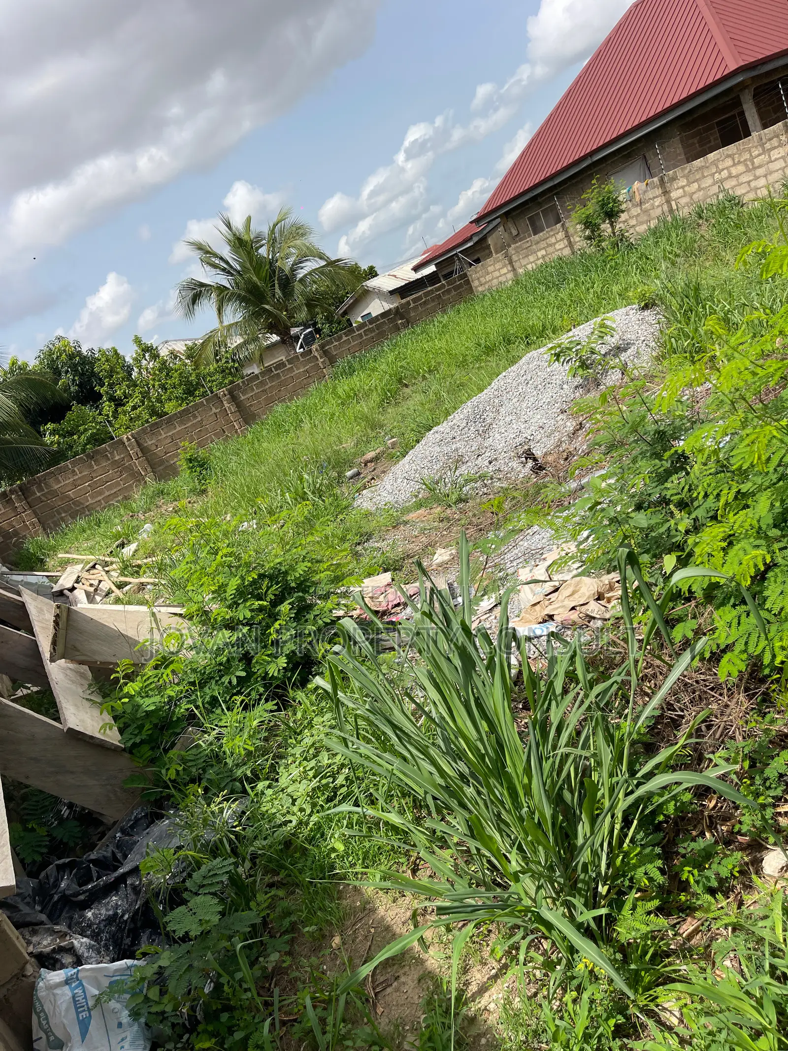 Wall and Gated Land for Sale at Amasaman 480,000 Cedis