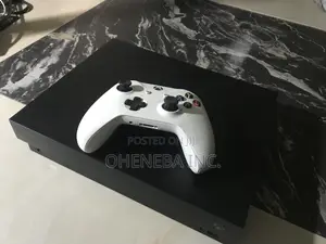 Xbox One X Console With 11 Games Installed + 1 Controller