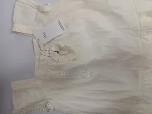 Marks and Spencer Offwhite Dress With Ruffled Trims