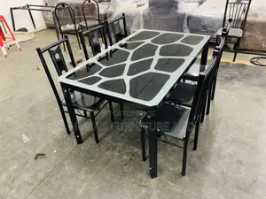 A Dining Table With 6 Chairs ( Glass )